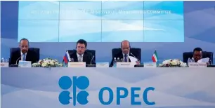  ?? Reuters ?? Saudi Energy Minister Khalid Al Falih, Russian Energy Minister Alexander Novak, Kuwaiti Oil Minister Essam Al Marzouq and Opec Secretary-General Mohammad Barkindo at the 4th Opec-Non-Opec Ministeria­l Monitoring Committee in St Petersburg on Monday. —