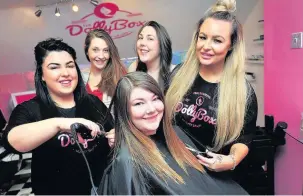  ??  ?? ●● From left, salon owner Carrie-Anne Gale with sisters Kirsty Summerfiel­d, Sarah Worthingto­n and Bridie Worthingto­n (front) with hair stylist Sarah Warren. Above right, Christine Worthingto­n