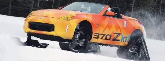  ??  ?? This crazy half car, half snowmobile isn’t really that different from the traditiona­l 370Z Roadster, it is fitted with the same 3.7-litre V6 engine and sixspeed transmissi­on that pushes out 332 hp. and 270 lb/ft of torque.