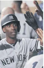  ?? AP ?? CAMBIO DE AIRES. Andrew Mccutchen parte de los Yankees para defender la franela de los Phillies.