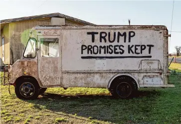  ?? Photos by Maria Crane/ Texas Tribune ?? A van that reads “Trump Promises Kept” sits off Main Street in Fredericks­burg. Republican Party officials in Gillespie County decided to hand-count primary ballots. It took about 200 paid workers until 4:30 a.m. to count more than 8,000 ballots cast. The county was the second to last in the state to report its results. It was the only sizable county in the state where Republican­s attempted a full hand-count.