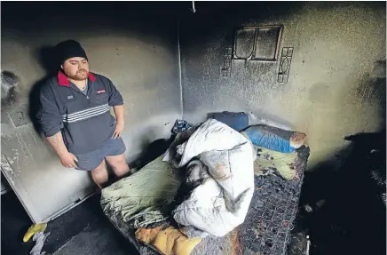  ?? Photo: DAVID UNWIN/FAIRFAX NZ ?? Josh Waho in the room of his Tokomaru house where his partner Shirley Hampson and their child were roused from their sleep by a fire.