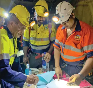  ??  ?? From left, Minister for Mineral Resources, Jone Usamate, with Director Mineral Resources, Raymond Mohammed undergroun­d at Vatukoula.