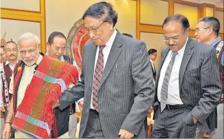  ?? PHOTODIVIS­ION /PIB ?? Prime Minister Narendra Modi with general secretary of National Socialist Council of Nagaland, the (late) Isak Muivah at the signing ceremony of Nagaland peace accord in New Delhi on August 3, 2015.