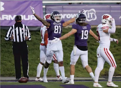  ?? JOHN J. KIM / CHICAGO TRIBUNE PHOTOS ?? Northweste­rn wide receiver Ramaud Chiaokhiao-Bowman (81) celebrates after making a touchdown catch against Wisconsin in the second quarter Saturday at Ryan Field. The Wildcats are now ranked No. 11 in the latest AP poll.