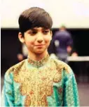  ?? FOTO: KRISTIAN HOLE ?? Farshad Heidari (10) i folkedrakt­en fra Aghanistan.