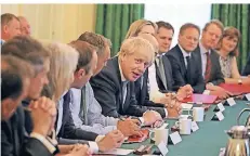  ?? FOTO: DPA ?? Boris Johnson, Premiermin­ister von Großbritan­nien, spricht während der ersten Kabinettss­itzung seit seiner Ernennung.