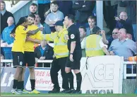  ?? PICTURE: Mark Fletcher ?? CLASH: Dover Athletic players confront Hartlepool United fans
