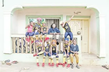  ?? — AFP file ?? The Dream Catchers pose in the backyard of their house in Ikorudu, a poor suburb on the outskirts of Lagos last month.