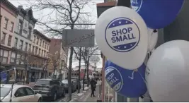  ??  ?? Diego Mendoza-moyers / Times Union Balloons around downtownTr­oy welcome shoppers to the area for Small Business Saturday. The promotion aims to boost support for local businesses a day after Black Friday.