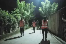  ?? ?? Residents participat­e in a citizen patrol to ensure safety in the Kaweni district of Mamoudzou on the French Indian Ocean island of Mayotte.