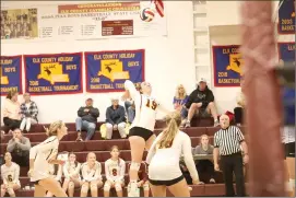  ?? Photo by Becky Polaski ?? Maddie Bierley, 19, takes to the air to attempt a kill for the Lady Crusaders late in the third set of their match against Johnsonbur­g on Thursday.