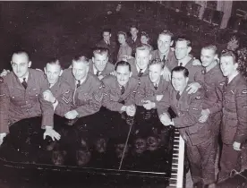  ?? SPECIAL TO THE EXAMINER ?? The RCAF dance band, including pianist Al Smith on left and saxophonis­t Harry Culley, second from right, performed in London.