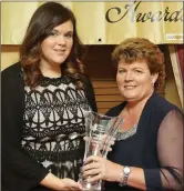  ??  ?? Lisa Cairns from Wicklow Local Sports Partnershi­p presents Fiona Shannon with the Sports Award.