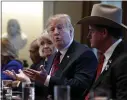  ?? JACQUELYN MARTIN — THE ASSOCIATED PRESS ?? President Donald Trump leads a roundtable discussion on border security with local officials Friday in the White House.