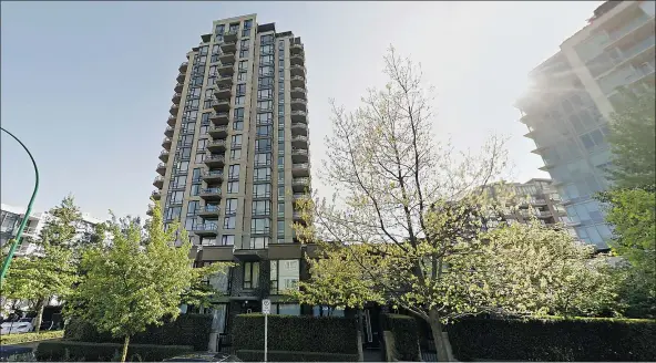  ?? — GOOGLE STREET VIEW ?? The tower at 151 West 2nd Street in North Vancouver where a unit was listed for $700,000 and sold in one day, with the same realtor representi­ng buyer and seller. Similar units in the building have sold for as much as $1.2 million, according to another...