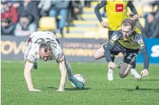  ?? ?? DERBY LOW: Bradford City’s Kevin McDonald and Harrogate Town’s Stephen Dooley collide during Saturday’s game.