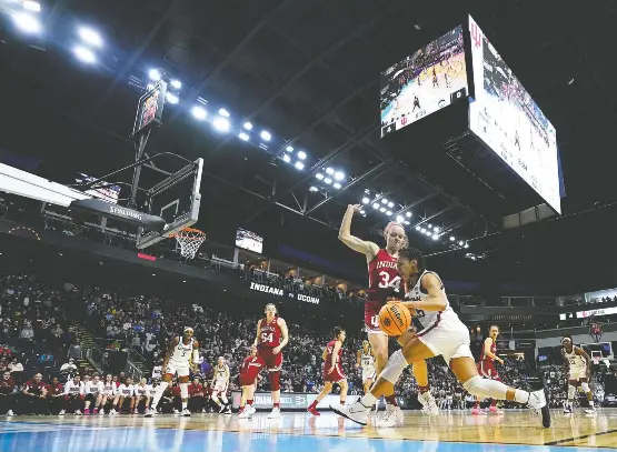  ?? FRANK FRANKLIN II/ASSOCIATED PRESS ?? Star guard Azzi Fudd, who had been out with a knee injury, returned for Connecticu­t during the Big East tournament, raising the Huskies’ hopes of claiming the NCAA title.