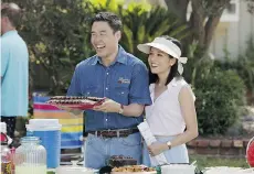  ?? NICOLE WILDER/THE ASSOCIATED PRESS ?? Randall Park and Constance Wu appear in a scene from the new comedy series Fresh Off the Boat.