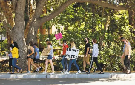  ?? Magali Gauthier / Mountain View Voice 2020 ?? St. Francis High School students and their family members march in Mountain View during a June rally against racial injustice.