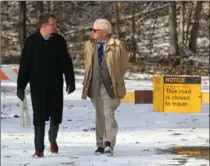  ?? DAVE CHIDLEY, THE CANADIAN PRESS ?? MPP Monte McNaughton, left, and John Fraser walk from the entrance to Pinery Provincial Park near Grand Bend on Friday.