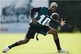  ?? AP Photo/Matt Rourke ?? ■ Philadelph­ia Eagles wide receiver DeSean Jackson catches a pass during practice at the team’s training camp Friday in Philadelph­ia.