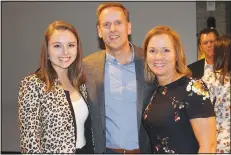  ?? NWA Democrat-Gazette/CARIN SCHOPPMEYE­R ?? Libby Ganoung (from left) and David and Michele Ganoung attend the Gentlemen of Distinctio­n VIP reception.