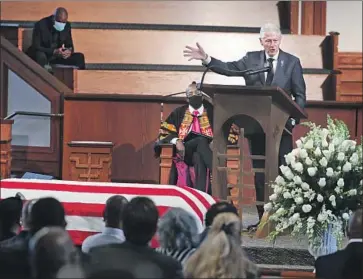  ?? Alyssa Pointer Atlanta Journal-Constituti­on ?? BILL CLINTON was one of three former presidents who spoke with emotional admiration for John Lewis at his funeral Thursday at Ebenezer Baptist Church in Atlanta. Theirs were not the only memorable speeches.