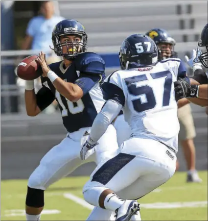  ?? GREGG SLABODA — TRENTONIAN FILE PHOTO ?? Quarterbac­k Michael Marchesano and TCNJ are off to an 0-3start this season.