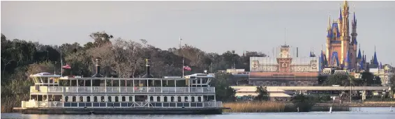  ?? JOE BURBANK, ORLANDO SENTINEL ?? The General Joe Potter ferry boat, named after the legendary Disney engineerin­g pioneer, sails across the Seven Seas Lagoon at the Magic Kingdom.