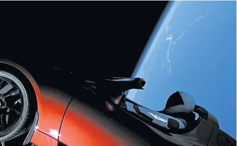  ??  ?? The successful launch of the Falcon Heavy rocket, top, and above, the Tesla car in space, with dummy, last night. The car stereo was playing Life on Mars by David Bowie, right