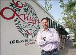  ?? ALEX HORVATH / THE CALIFORNIA­N ?? Luigi’s owner Gino Valpredo poses on the sidewalk outside his family’s 100-plus-year-old institutio­n in the heart of Old Town Kern in this 2019 photo.
