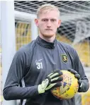 ??  ?? Town keeper Ryan Schofield is on loan with Scottish side Livingston