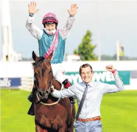  ?? PA WIRE ?? Siskin and Colin Keane, with groom Dan MacGrianna, after winning the 2,000 Guineas at the Curragh last night