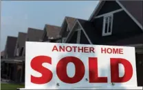  ?? The Canadian Press ?? The Canadian Real Estate Associatio­n says home sales in September fell 0.4 per cent compared with August.