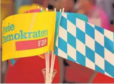  ?? FOTO: DPA ?? 60 634 Stimmen hatte die FDP in den strittigen Bezirken bekommen.