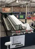  ??  ?? Network Rail is installing escalators at Edinburgh Waverley to improve access from the main concourse to Platforms 8, 9 and 10. This is the progress on July 23, with the company keen to have the work completed before crowds arrive for the Edinburgh...