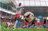  ?? AFP ?? Leipzig defender Dayot Upamecano (centre) reacts after Bayern Munich’s Arjen Robben (third from right) scored a 95th-minute winner on Saturday. —