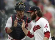  ?? TONY DEJAK — ASSOCIATED PRESS ?? Yan Gomes, left congratula­tes Ben Taylor after the Indians defeated the White Sox, 9-1, on May 30. The Indians have won five straight.
