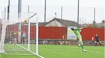  ?? ?? Pick it out Annan keeper Greg Fleming couldn’t keep out Kieran Moore’s strike