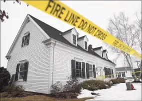  ?? Brian A. Pounds / Hearst Connecticu­t Media ?? Fire line tape surrounds the Roxbury Ambulance building, site of an arson investigat­ion at 27 North St. in Roxbury on Sunday.