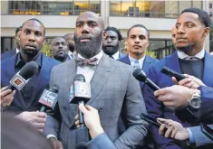  ?? RICHARD DREW, AP ?? Former NFL player Anquan Boldin, left, the Eagles’ Malcolm Jenkins, center, and the 49ers Eric Reid were among 13 former and current players at Tuesday’s meetings.