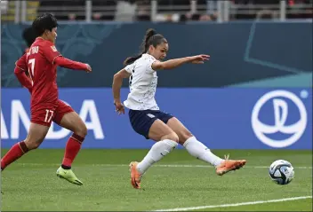  ?? ANDREW CORNAGA — THE ASSOCIATED PRESS ?? The United States' Sophia Smith scores her side's first goal during a Women's World Cup Group E match against Vietnam at Eden Park in Auckland, New Zealand, on Saturday.