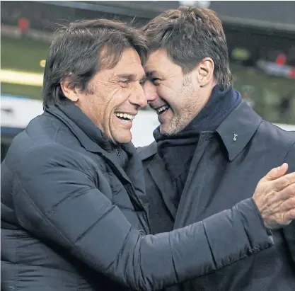  ??  ?? Chelsea manager Antonio Conte, left, and Tottenham boss Mauricio Pochettino before a match last season.