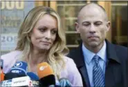  ?? AP FILE ?? Stormy Daniels and her attorney, Michael Avenatti, are shown in New York City on April 16, 2018.