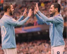  ?? GETTY ?? La coppi Bernardo Silva, a sinistra, e Ilkay Gündogan dopo un gol