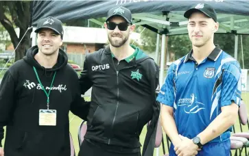  ??  ?? Charity match organiser Matt Runnalls (left) alongside Glenn Maxwell and East All Stars captain Sam Batson before the match began on Sunday afternoon.