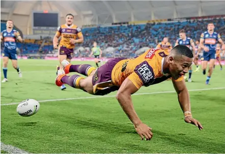  ?? GETTY IMAGES ?? Jamayne Isaako scores for the Brisbane Broncos against Gold Coast Titans in July.