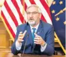  ?? GOVERNOR’S OFFICE ?? Gov. Eric Holcomb announces to his executive orders regarding COVID-19 on Tuesday in Indianapol­is.