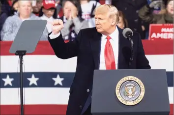  ?? Ben Gray / Associated Press ?? President Donald Trump addresses the crowd at a rally, on Saturday in Valdosta, Ga., for U.S. Senators Kelly Loeffler, R-Ga., and David Perdue, R-Ga., who are both facing runoff elections.